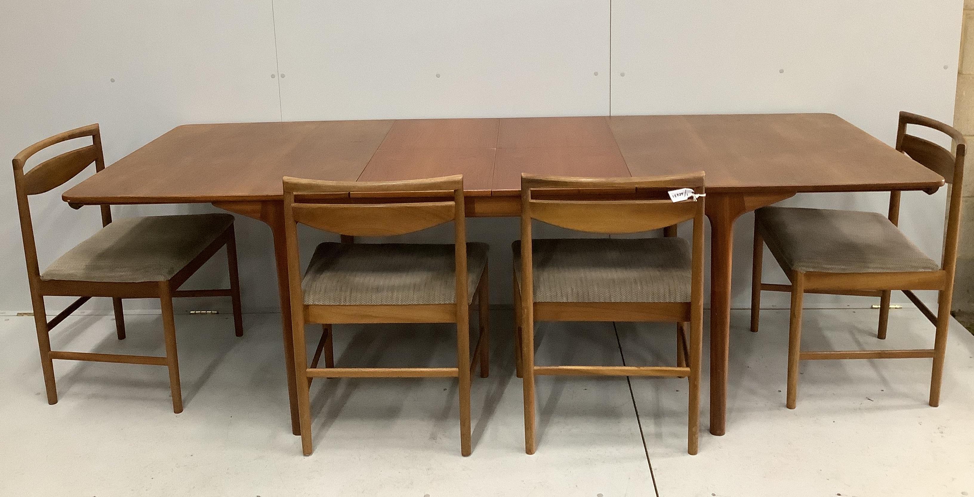 McIntosh of Kirkcaldy, a mid century teak dining suite comprising sideboard, width 213cm, depth 47cm, height 75cm, extending dining table and four chairs